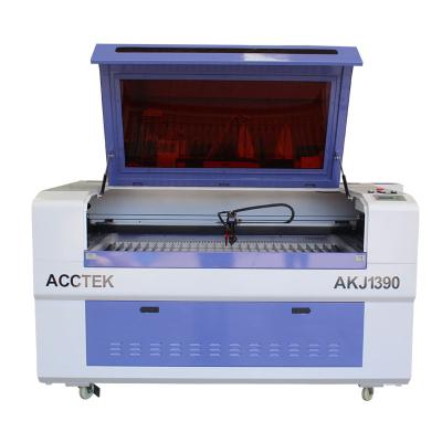 China Laser Engraving Rotary Laser Engraver 1390 1610 CO2 Laser Engraving Machine From Japan for sale