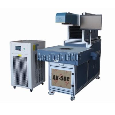 China 3D 60W 100W Air-cooled Dynamic CO2 Laser Tube Locating Engraving Machine For Leather Jeans for sale