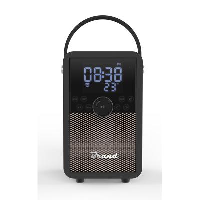 China New Design 2022 Function Telephone FM Radio Alarm Clock Speaker Portable Wooden Wireless Speakers for sale