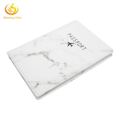 China Durable Faux Passport Waterproof Rfid Leather Cover Blocking Travel Wallet Case Marble Passport Holder for sale