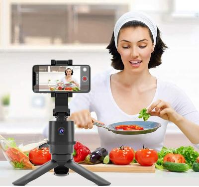 China Adjustable Auto Tracking Phone Holder 360 Face Tracking For Selfie Live Streaming Vlog Smart Tracking Holder for sale