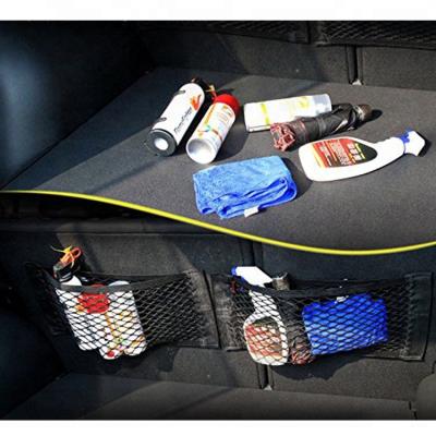 China Convenient Magic Storage Mesh Net Bag Auto Stick Car Back Seat for sale