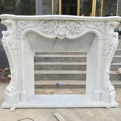 China Modern Luxury Hand Carved Home Decoration Cultured White Marble Fireplace for sale