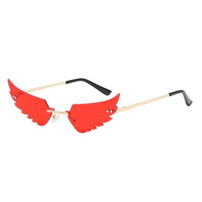 China Fashion Sunglasses Euromonk Angel Wing Shape Sunglasses Women Metal Frame Party Sunglasses Custom for sale