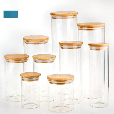 China Freshness Preservation Round Airtight Coffee Tea Spice Glass Jar Kitchen Organizer Storage Bottles Sealed Glass Food Storage Jars with Bamboo Lid for sale