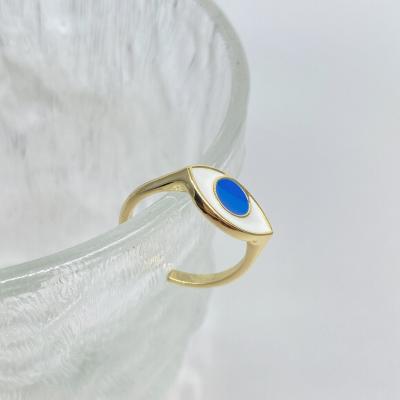 China Hot Sale Amazon Nickel Lead Free 18K Gold Plated Oil Blue Eyes Ring White Blue Enamel Evil Drip Open Ring for sale