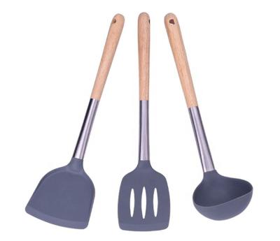 China Sustainable Stylish Designed Heat Resistant Wooden Handle Silicone Cookware Set for sale