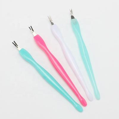 China Colorful Plastic Finger Nail Beauty Nail Polish Remover Tools Nail Cutical Pusher for sale