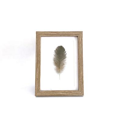 China Natural Plant Directly Peep Paper Wrapped MDF Feather Picture Photo Frames For Decoration for sale