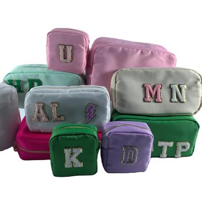 China Fashion Travel Briefcase Small Running Waterproof Nylon Embroidery Patches Logo Make Up Bag Custom Cosmetic Bags for sale