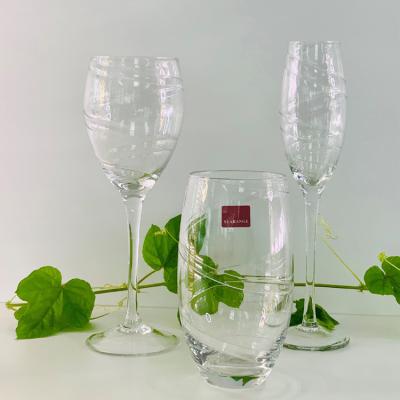 China Long lasting good quality pure crystal stemware ripple wine glass swirl red wine stemmed glass for sale