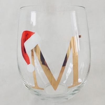 China Viable Popular Hot Selling Christmas Cap Wine Glass Bar Alphabet Glass Stemless Cup And Tumbler Pattern Stealth Mug for sale