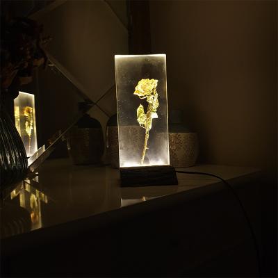 China Modern Hot Selling Art Craft Table Resin Wooden Home Decoration Lamp Customized Epoxy Resin Night Table Desk Lamp for sale