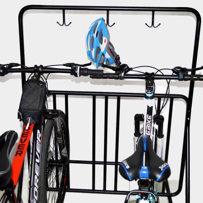 China Steel Pipe Twitter Rack Floor Commercial Bike Racks Rack With Helmet Hanger For Bicycles for sale