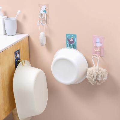 China Stainless Steel Cartoon Punch Storage Rack Free Standing Bathroom Sink Wall Hanging Towel Hook Wall Storage Hook for sale