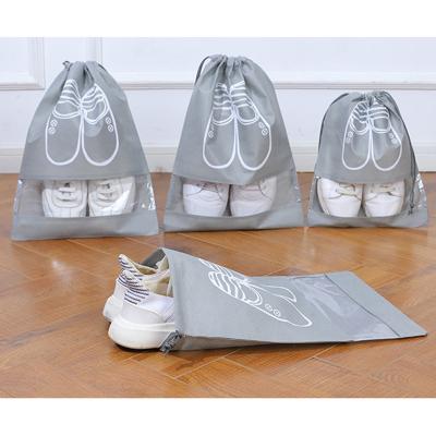 China Drawsting Packaging Bags Portable Shoes Thicken Non-woven Waterproof Shoe Travel Bag Home Clothing Storage Shoe Travel Bags for sale