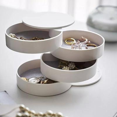 China Creative Jewelry Boxes Home Decoration 4 Layers Ring Box Multi-Function Earring Case Container Rotating Plastic Jewelry Box Organizer for sale