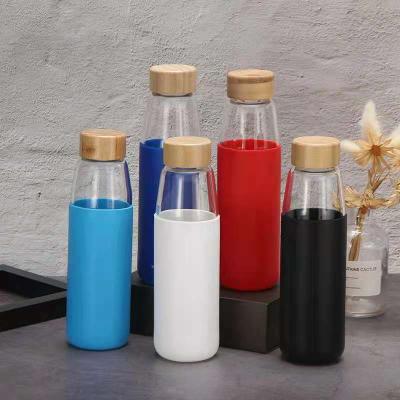 China Nordic Viable Bottle 500ml Silicone Glass Water Device Cover Bamboo Cup Cover Glass Mug for sale