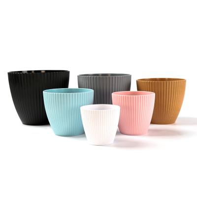 China Modern Wholesale Nordic Style Indoor And Outdoor Pots Plant Garden Multiple Colors Gardening Plastic Flower Pot for sale