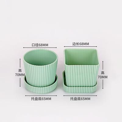 China Brand Modern Indoor Chinese Plastic Flower Pots Printing Flower Pots Potted Indoor Decorative Planter for sale