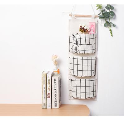 China New Sustainable Multifunctional Nonwoven Wall Door Storage Hanging Bag for sale