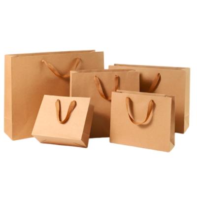 China Recycled Materials Food Package Brown Kraft Paper Bag With Paper Handle for sale