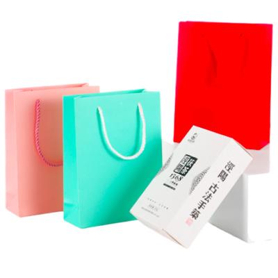 China Luxury Recycled Materials Fashion Gift Recyclable Paper Bags With Your Own Logo for sale