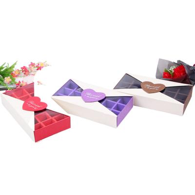 China Creative Recycled Materials 18 Holes Chocolate Strawberry Box Chocolate Box Wedding Favor Round Box With PVC Window for sale