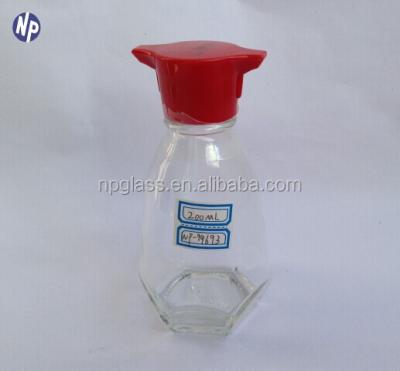 China 200ml frying oil kikkoman soy sauce glass bottles with red plastic cap for sale