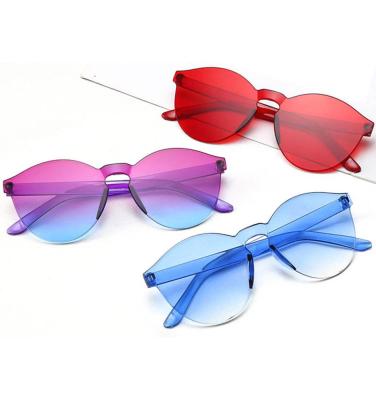 China New Shield Fashion Sun Glasses Rimless Light Color Lens One Piece Luxury Candy china trendy sunglasses for sale