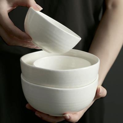 China New Design Irregular Shape Crystal White Mini Soup Bowls Viable Porcelain With Reactive Luster Small Ceramic Dinner Rice Bowl for sale