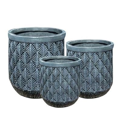 China Indoor and outdoor hotel cement style stable Nordic elegant pattern fiber sheet round flowerpot decoration for sale