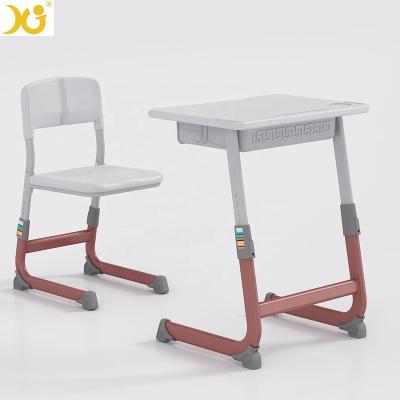 China Modern Popular Cheap Price Suppliers Simple Design School Desk And Chair In UK for sale