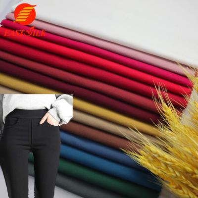 China Anti-Static Fabric Textiles Sanded Knitted NR Roma Spandex Pants Fabric Fabrics For Trousers for sale