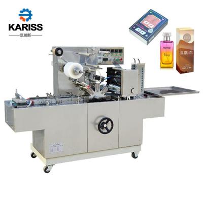 China Automatic Food Biscuit Cardboard Box 3d Packing Machine Bopp Film Game Card Cellophane Wrapping Machine for sale