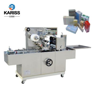 China Food Comdom Automatic Box Tea Packing Box Wrapping Cellophane Wrap Machine for sale