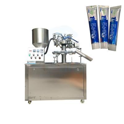 China Food Spin Disc 10-300g Soft Tube Filling Sealing Machine , Cosmetic Toothpaste Tube Filling Machine for sale