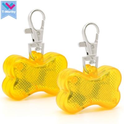 China Viable Pet Safety Bone Train LED Dog Collar Light Tag Key Chain Pet Flashing Pendant for sale