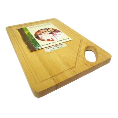 China Rectangle Wood Chopping Board Oak Cutting Board Pizza Chopper Sustainable Natural Rubber Wooden Chopping Board With Handle for sale