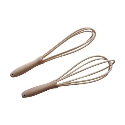 China Viable Natural Wooden Egg Beater With Rattan Cables Egg Agitator Handle High Temperature Resistant Wooden Manual Egg Beater Wooden Rotating Mixer for sale