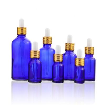 China 5ml 10ml 15ml 30ml 50ml Essential Oil Serum Gold Collar Luxury Empty Cosmetic Bottle Dropper 10ml Amber Glass Bottle With Droppe for sale