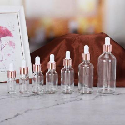 China Cosmetic Serum 15ml 30ml 50ml 5ml 2oz White Luxury 15ml Bamboo Frosted Essential Oil 10ml Dropper 15ml Pink Glass Bottle for sale