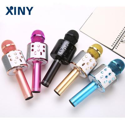 China Handheld Microphone With Colorful Home Speaker Xiny Cheap Price Handheld Kids Use Wireless Karaoke Microphone Party MIC With Speaker for sale