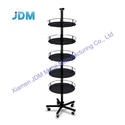 China Corrosion Protection Customized Style Fashion Nice Metal Floor Makeup Display Rack Revolving Steel Cosmetic Shop Display Rack for sale