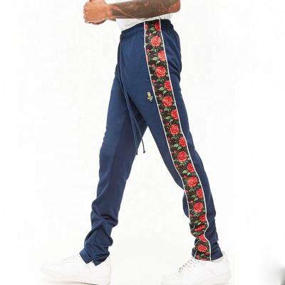 China 2021 Anti-pilling Mens Streetwear Polyester Floral Stripe Stylish Track Pants for sale