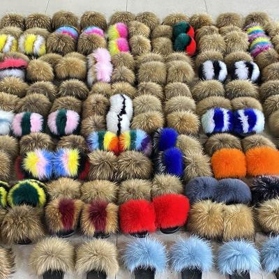 China Cushioning Pairs Can Be Customized 2021 Wholesale Fancy Slides Fur Slipper Mix Raccoon Hair And Fox Hair Fur Slippers for sale