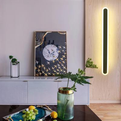 China Modern simple outdoor waterproof creative polycarbonate wall lamp strip long background led wall light IP65 for garden villa for sale