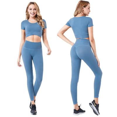 China Breathable Activewear Sets Yoga Pants Short Sleeves Sports Bra Women Gym Clothing for sale