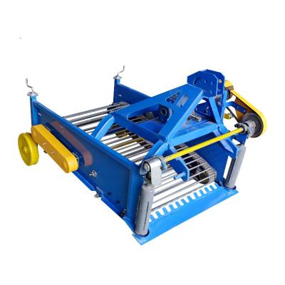 Cina Guarantee Unique Quality Agricultural Machine Cuboid Metal Digger Potato Digger Wheeled Machine Harvesting Potatoes in vendita