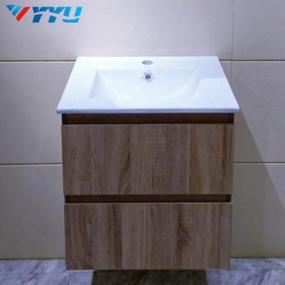 China Waterproof PVC Nature Bathroom Cabinet Small Size Wooden Color With Basin for sale